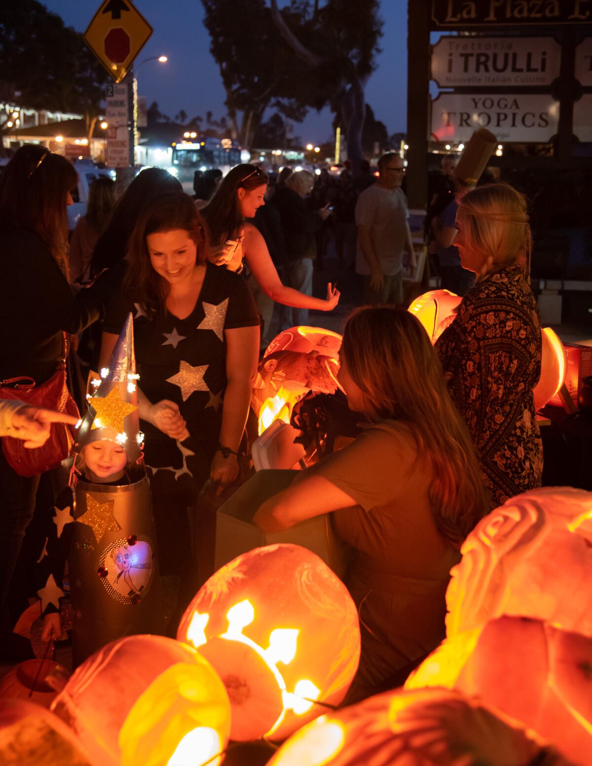 Thousands of costumed trick-or-treaters will stroll up and down “Pumpkin Lane,” aka South Coast Hwy 101, from Encinitas Blvd to K Street, on Oct. 31.
