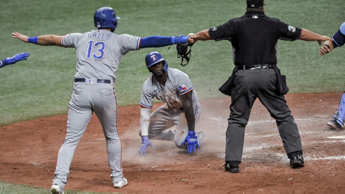 Lee pitches Rangers past Rays 5-1 and into ALCS - The San Diego