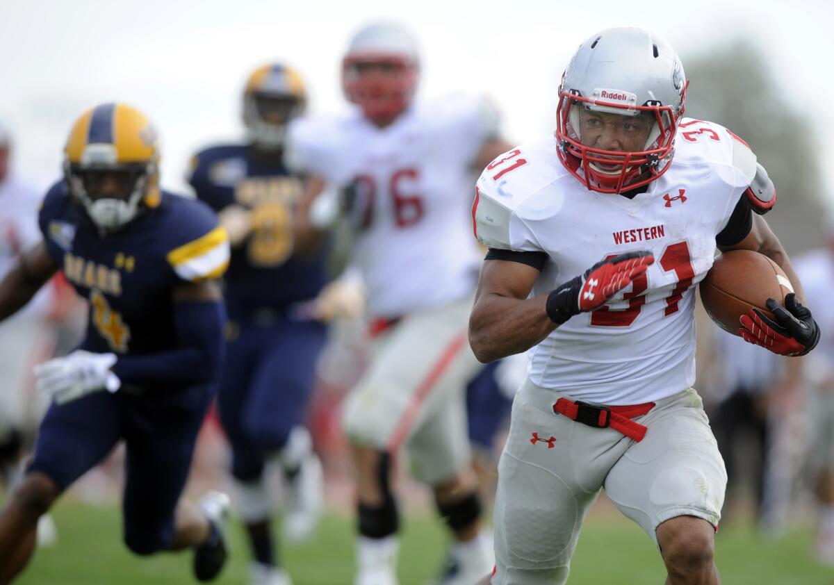 Western State's Austin Ekeler carries against Northern Colorado on Sept. 5, 2015.
