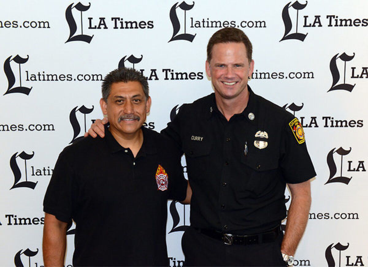 Firefighter Cruz Macias, left, and Fire Capt. Mark Curry of the Los Angeles Fire Department will be facing off at The Taste this weekend.