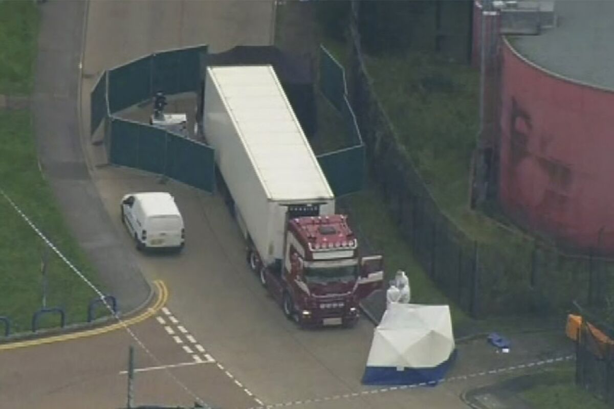 Forensic officers are pictured at the scene after 39 people were found dead in a truck Oct. 23 in Thurock, southern England.