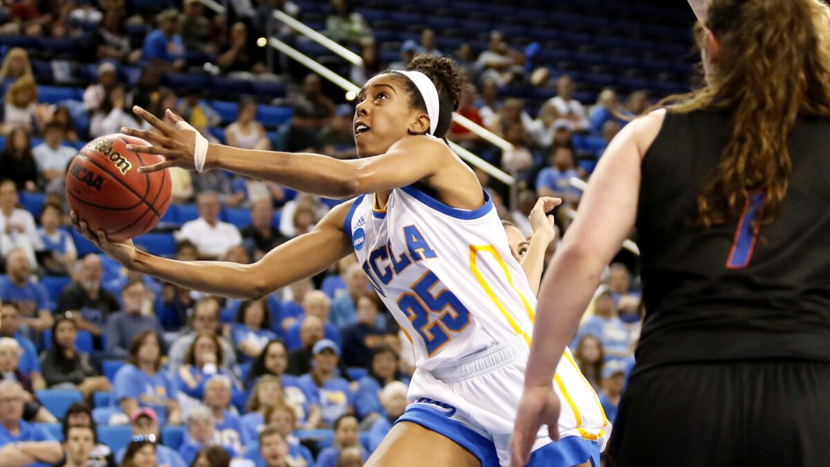 UCLA forward Monique Billings gets down the lane against Boise State for a layup on Saturday.