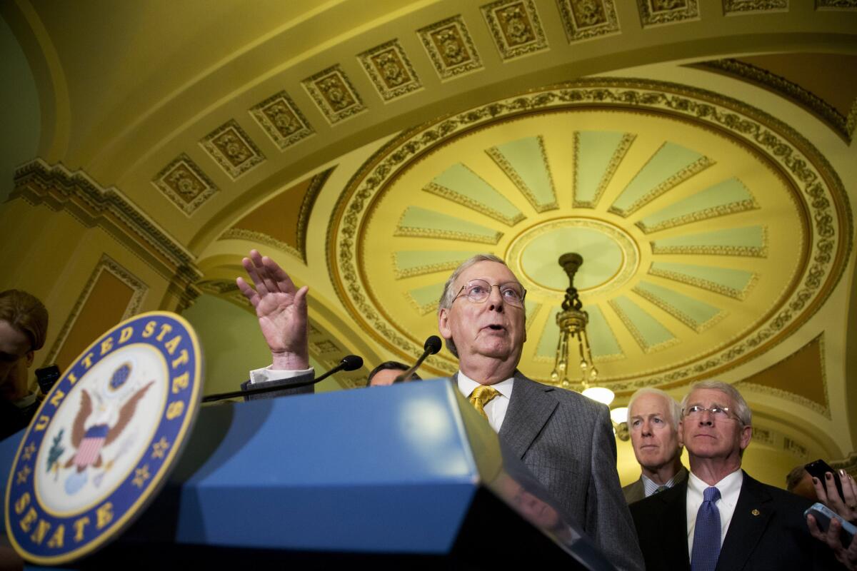 Senate Majority Leader Mitch McConnell (R-Ky.), center, said the Senate will again attempt to vote on the free-trade measure in coming days.