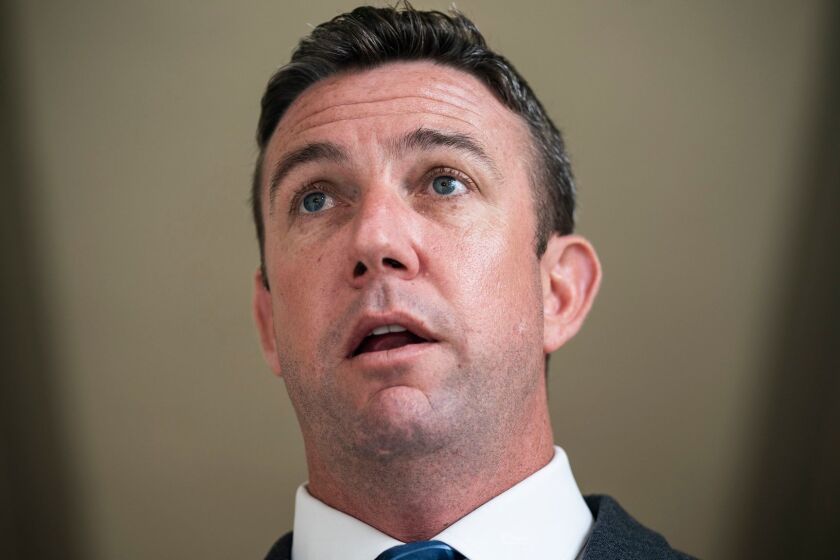 Mandatory Credit: Photo by JIM LO SCALZO/EPA-EFE/REX (10231887b) Republican Congressman from California Duncan Hunter speaks to the media about helmet cam footage of Navy SEAL Chief Eddie Gallagher in the Rayburn House Office Building in Washington, DC, USA, 08 May 2019. Hunter said the footage should exonerate Gallagher of charges against him, including premeditated murder and attempted murder while serving in Iraq. Hunter himself is out on bail for numerous federal charges, including wire fraud and campaign finance crimes. Rep Duncan Hunter speaks on Navy SEAL Chief Eddie Gallagher, Washington, USA - 08 May 2019 ** Usable by LA, CT and MoD ONLY **