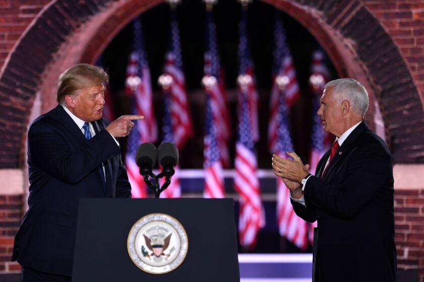 US President Donald Trump and US Vice President Mike Pence attend the third night of the Republican National Convention at Fort McHenry National Monument in Baltimore, Maryland, August 26, 2020. (Photo by SAUL LOEB / AFP) (Photo by SAUL LOEB/AFP via Getty Images)