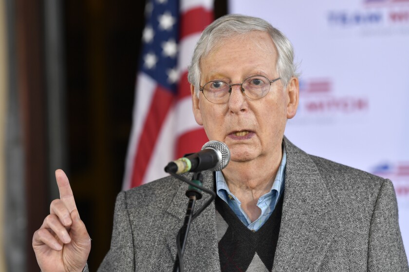 Senate Majority Leader Mitch McConnell speaks to supporters