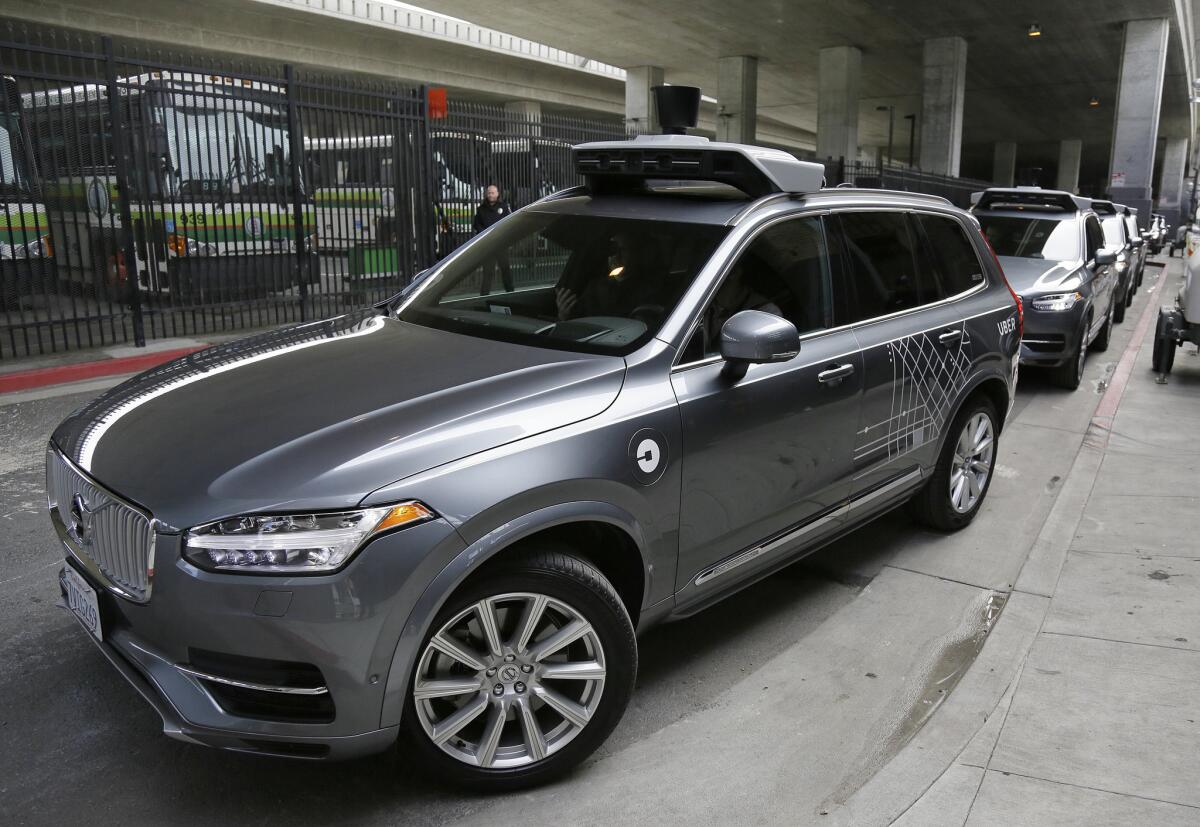 An Uber self-driving car heads out for a test drive Dec. 13 in San Francisco.