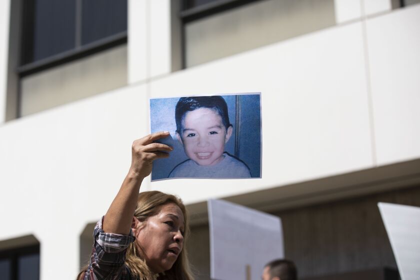 LOS ANGELES, CALIF. - JULY 16, 2019: Concepcion Avalos, the grandmother of Anthony Avalos who died last year, holds up a photo of Noah Cuatro, a 4-year-old boy who died on July 6, at a press conference at the Los Angeles County Department of Child and Family Services in Los Angeles, Calif. on Tuesday, July 16, 2019. CuatroÕs parents claim he drowned, but his death is being investigated as a possible homicide. (Liz Moughon / Los Angeles Times)