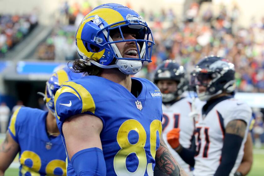 INGLEWOOD, CALIF. - DEC. 25, 2022. Rams tight end Tyler Higbee celebrates after scoring a touchdown.