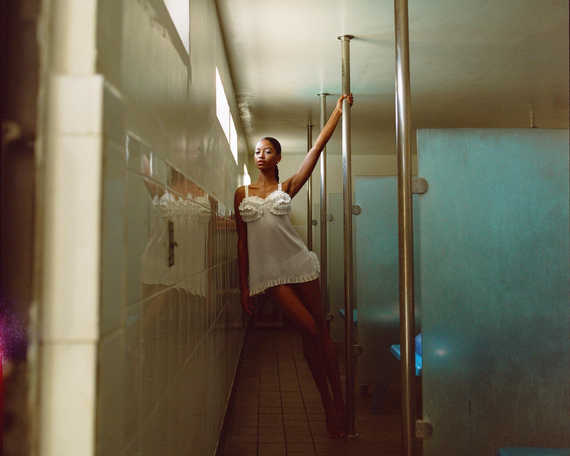 Madelane wears Dior slip dress from the Ruby.