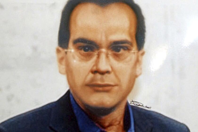 FILE - This photo reproduction of a computer generated image released by Italian Police of Mafia top boss contender Matteo Messina Denaro, is displayed at the Palermo police headquarters, Italy, Thursday, April 6, 2007. Matteo Messina Denaro, a convicted mastermind of some of the Sicilian Mafia’s most heinous slayings, died on Monday, Sept. 25, 2023, in a hospital prison ward, several months after being captured as Italy’s No. 1 fugitive and following decades on the run, Italian state radio said. (AP Photo/Alessandro Fucarini, File)