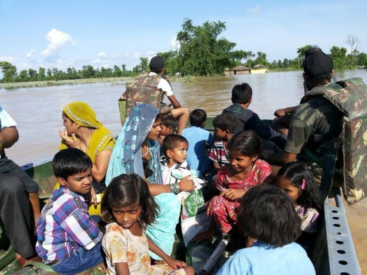 Indian army troops engage in rescue operations in flood hit areas in Pilibhit, Uttar Pradesh, India, June 21, 2013.