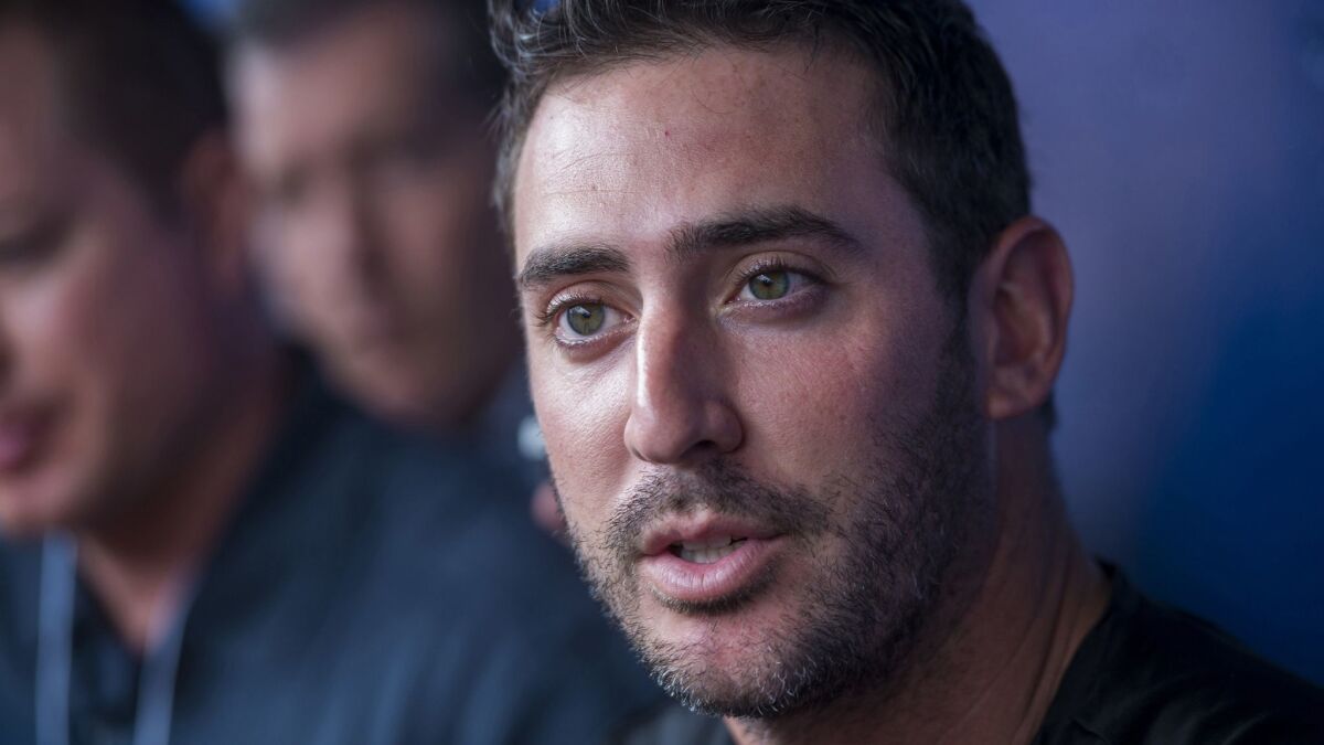 Pitcher Matt Harvey, shown in spring training with the New York Mets a year ago, was signed by the Angels as a free agent.