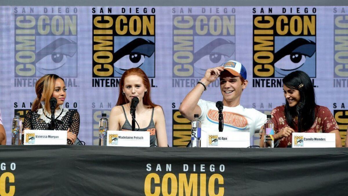 "Riverdale's" Vanessa Morgan, left, Madelaine Petsch, KJ Apa and Camila Mendes in Hall H at the San Diego Convention Center.