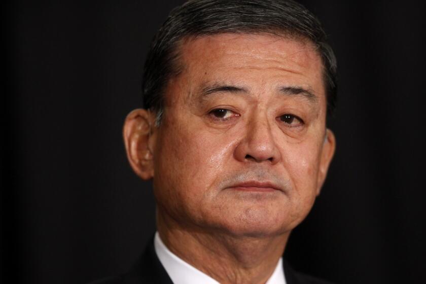 Veterans Affairs Secretary Eric Shinseki prepares to speak at a meeting of the National Coalition for Homeless Veterans in Washington.