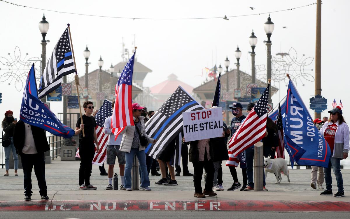 Supporters of then-President Trump rally in Huntington Beach on Jan. 6, 2021. 