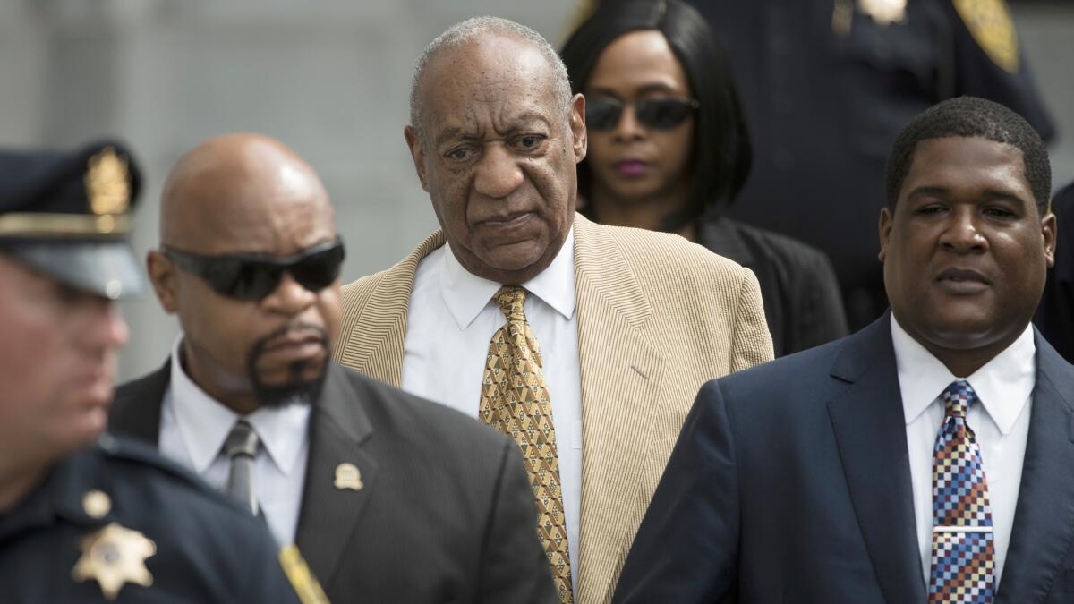 Entertainer Bill Cosby leaves a pretrial hearing in his criminal sex-assault case at Montgomery County Courthouse in Norristown, Pa., in July. A judge denied Cosby's effort to compel the accuser in his case to testify before trial.