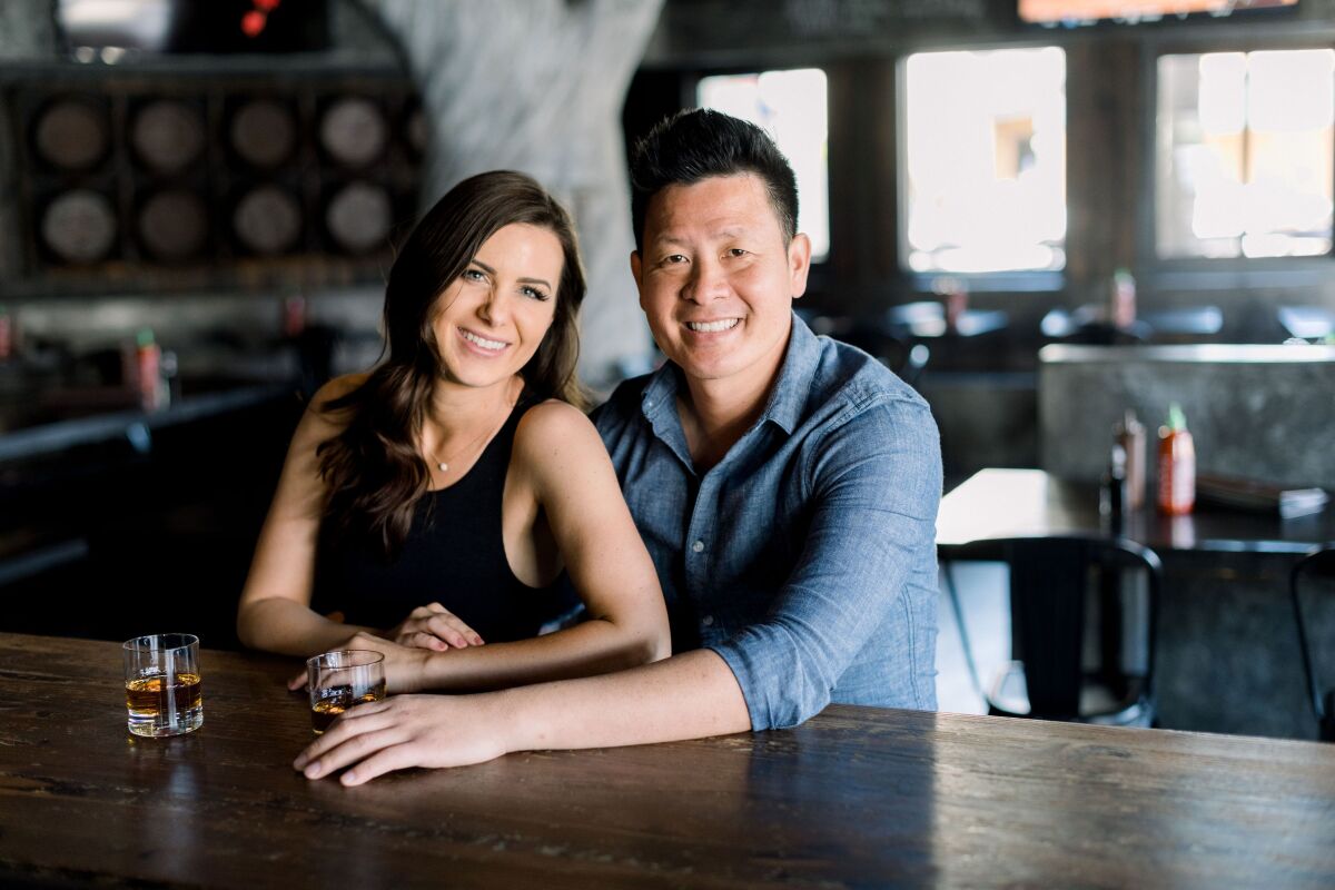 Brittany Merrill Yeng and Steven Yeng of Skrewball Whiskey Co. in Ocean Beach are donating up to $500,000 to a fund for laid-off bartenders.