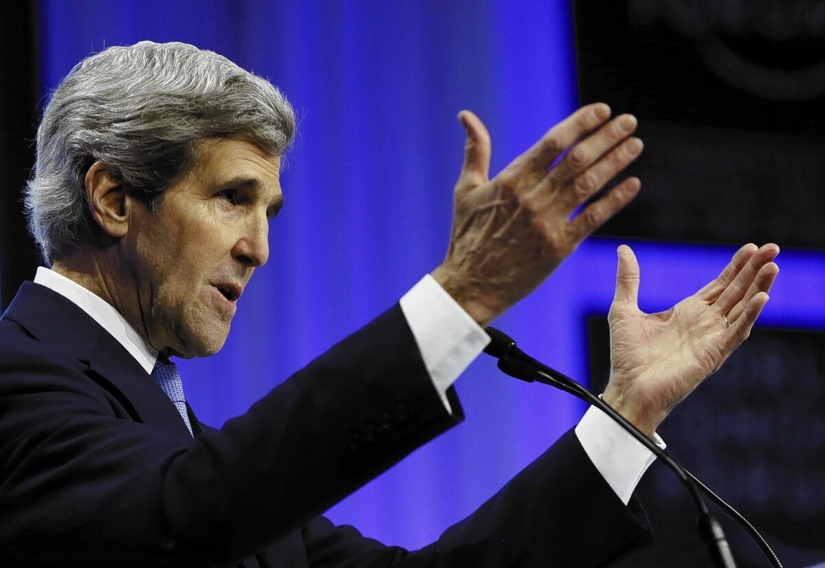 Secretary of State John F. Kerry delivers a speech at the World Economic Forum in Davos, Switzerland, where he said that "it is a myth that we are pulling back or giving up or standing down [in the Mideast].... Nothing could be further from the truth."