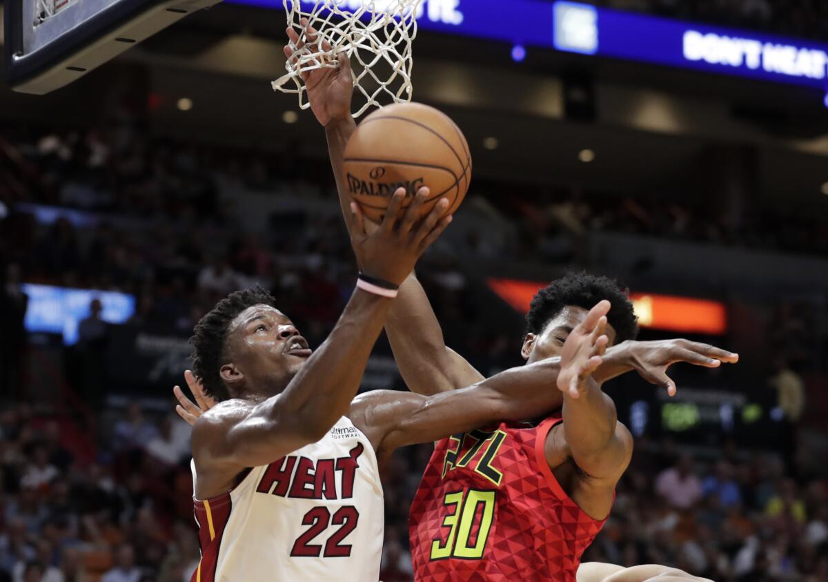 Miami Heat's Jimmy Butler Debuts New Look At Media Day - Sports