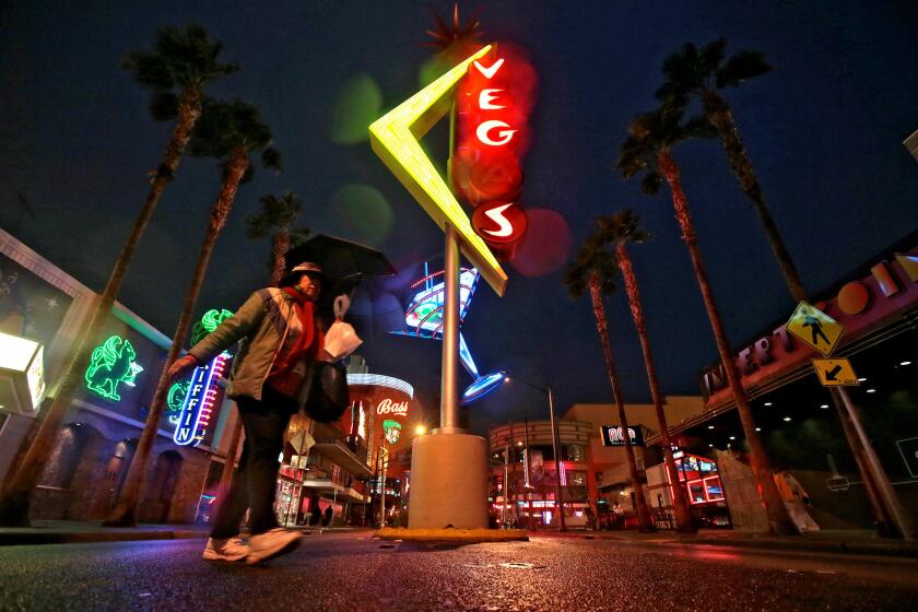 Neon signs brighten Fremont Street in downtown Las Vegas.