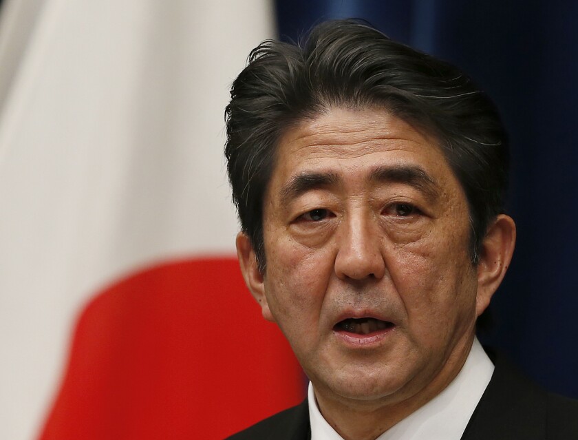 FILE - Then Japan's new Prime Minister Shinzo Abe speaks during his first press conference at the prime minister's official residence in Tokyo Wednesday, Dec. 26, 2012. Former Japanese Prime Minister Abe, a divisive arch-conservative and one of his nation's most powerful and influential figures, has died after being shot during a campaign speech Friday, July 8, 2022, in western Japan, hospital officials said. (AP Photo/Shizuo Kambayashi, File)