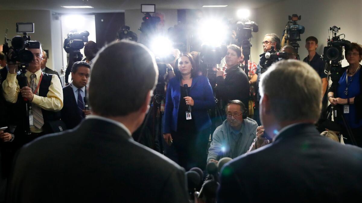 Members of the senate Intelligence Committee hold a press conference on Capitol Hill in Washington following a closed-door meeting with Deputy Attorney General Rod Rosenstein.