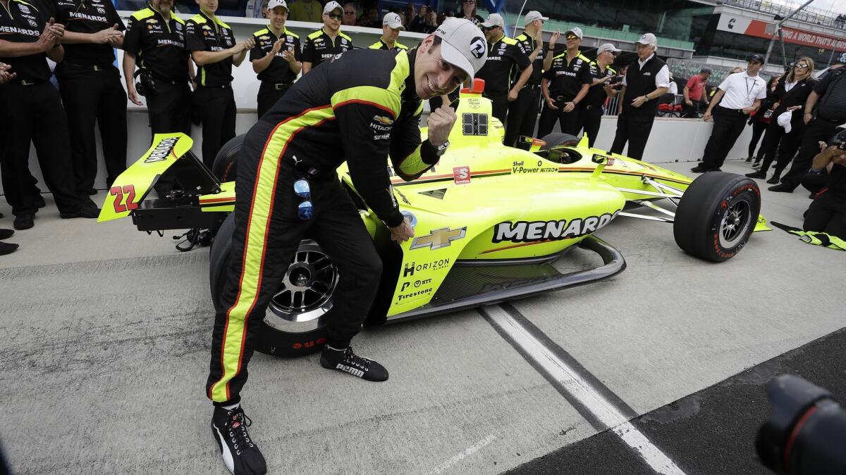 Simon Pagenaud of France celebrates after winning the pole for the Indianapolis 500 on Sunday. Pagenaud earned his first career pole in the race with a four-lap average of 229.992 mph.