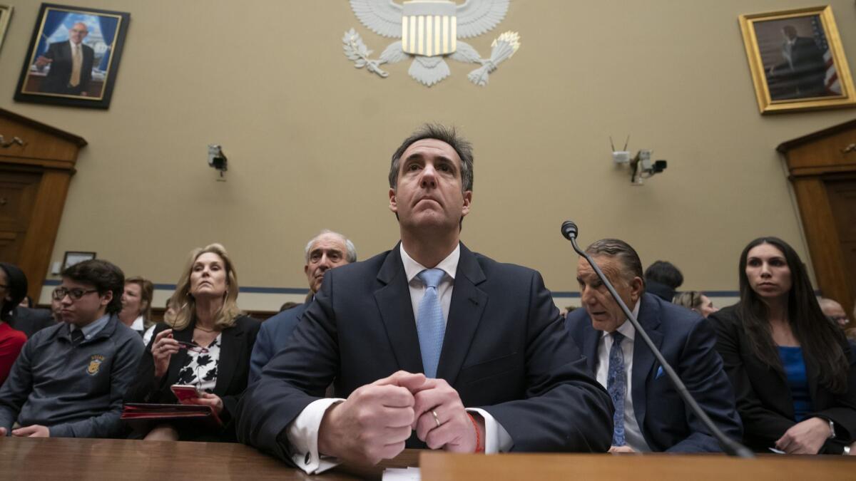 Michael Cohen finishes a day of testimony on Capitol Hill in Washington on Feb. 27.