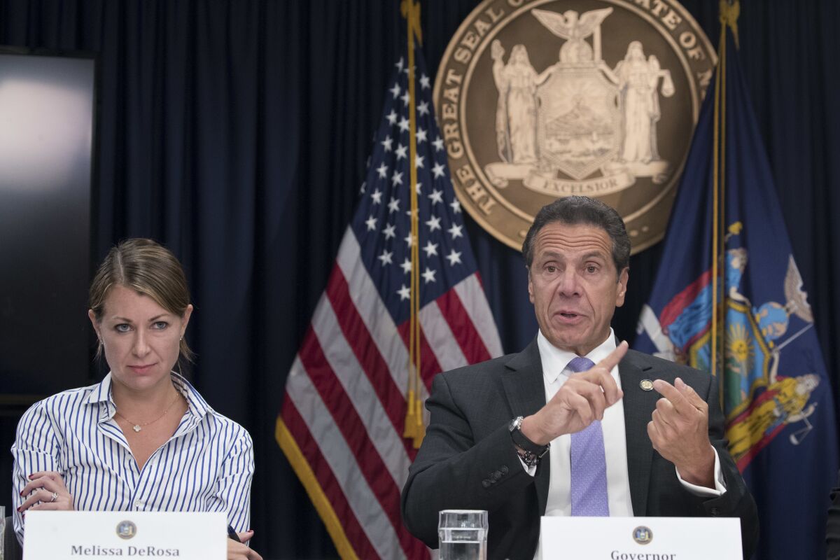 New York Gov. Andrew Cuomo, right, with Secretary to the Governor Melissa DeRosa in 2018