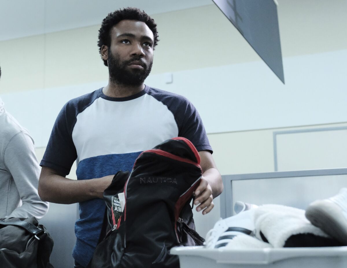 This image released by FX shows Donald Glover in a scene from the second season of "Atlanta." The third season will premiere at the South by Southwest Film Festival. (Guy D'Alema/FX via AP)