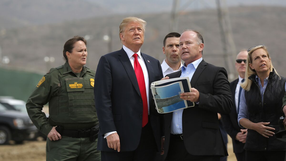 President Donald Trump toured the border wall prototypes near the Otay Mesa Port of Entry in San Diego County on March 13, 2018.