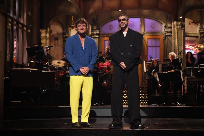 SATURDAY NIGHT LIVE -- "Bad Bunny" Episode 1846 -- Pictured: (l-r) Pedro Pascal and host Bad Bunny during the Monologue on Saturday, October 21, 2023 -- (Photo by: Will Heath/NBC via Getty Images)