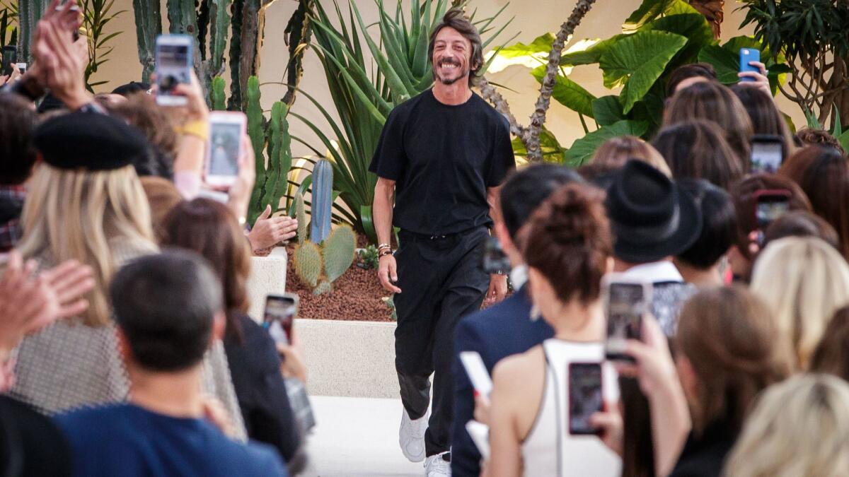 Valentino creative director Pierpaolo Piccioli at the finale of the spring and summer 2019 women's runway show in Paris on Sept. 30, 2018.