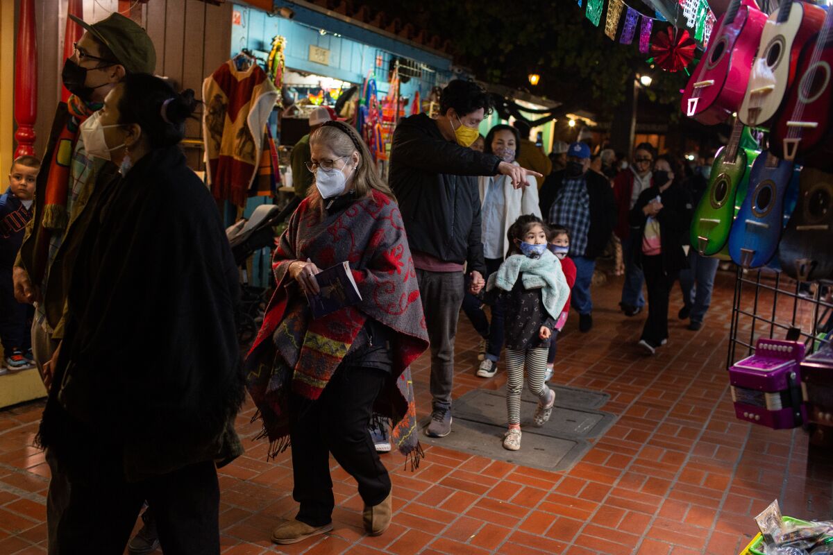 People take part in the Dia de los Reyes procession.
