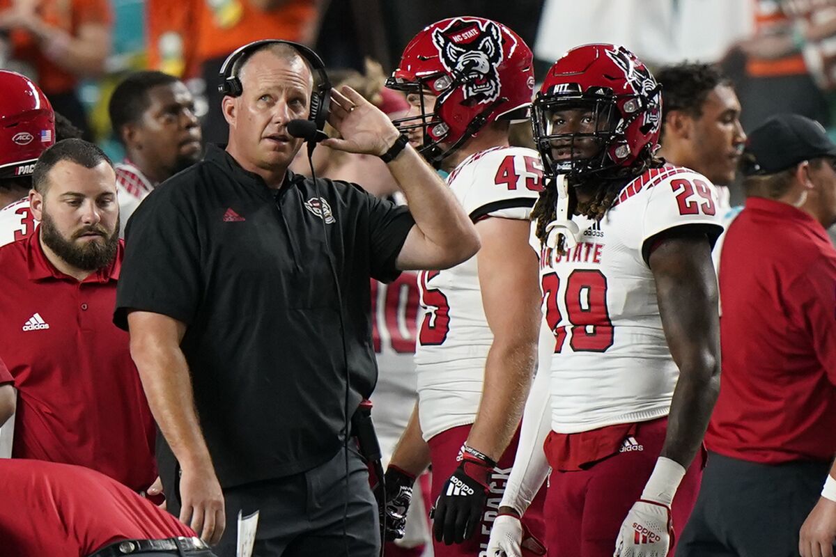 N.C. State head coach Dave Doeren walks the sideline during a game against Miami in October.
