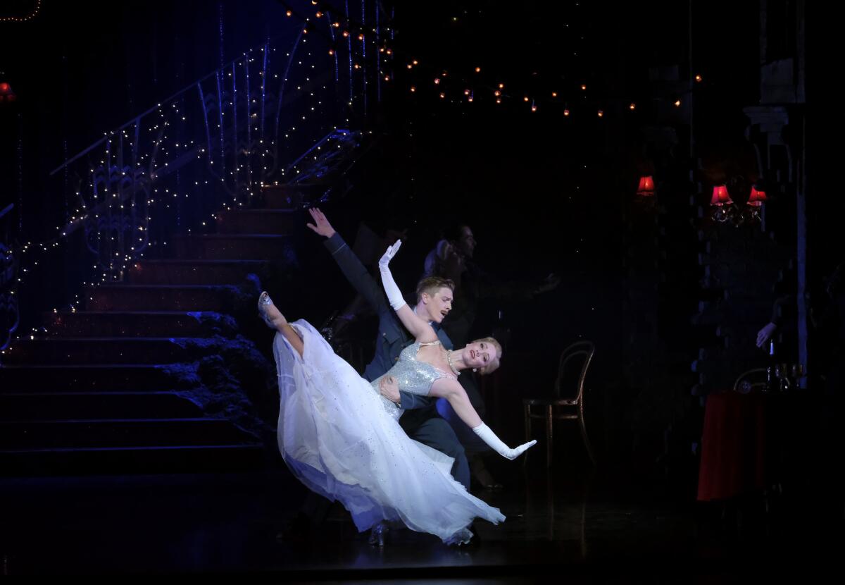 The pilot (Andrew Monaghan) dancing with Cinderella (Ashley Shaw).