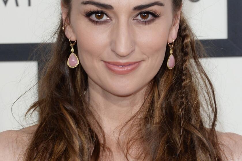 Singer Sara Bareilles arrives at the 2014 Grammy Awards.