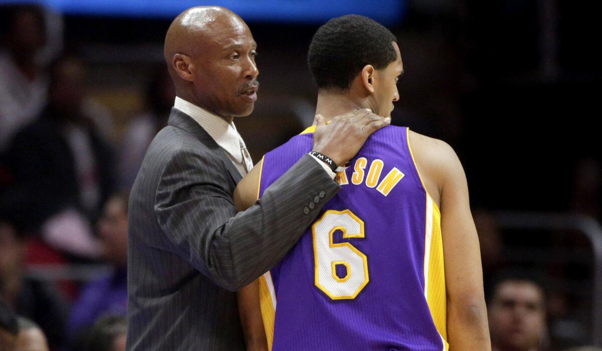 Lakers Coach Byron Scott, talking to rookie guard Jordan Clarkson during a game against the Clippers on April 7, has his eye on the future with the upcoming NBA draft.
