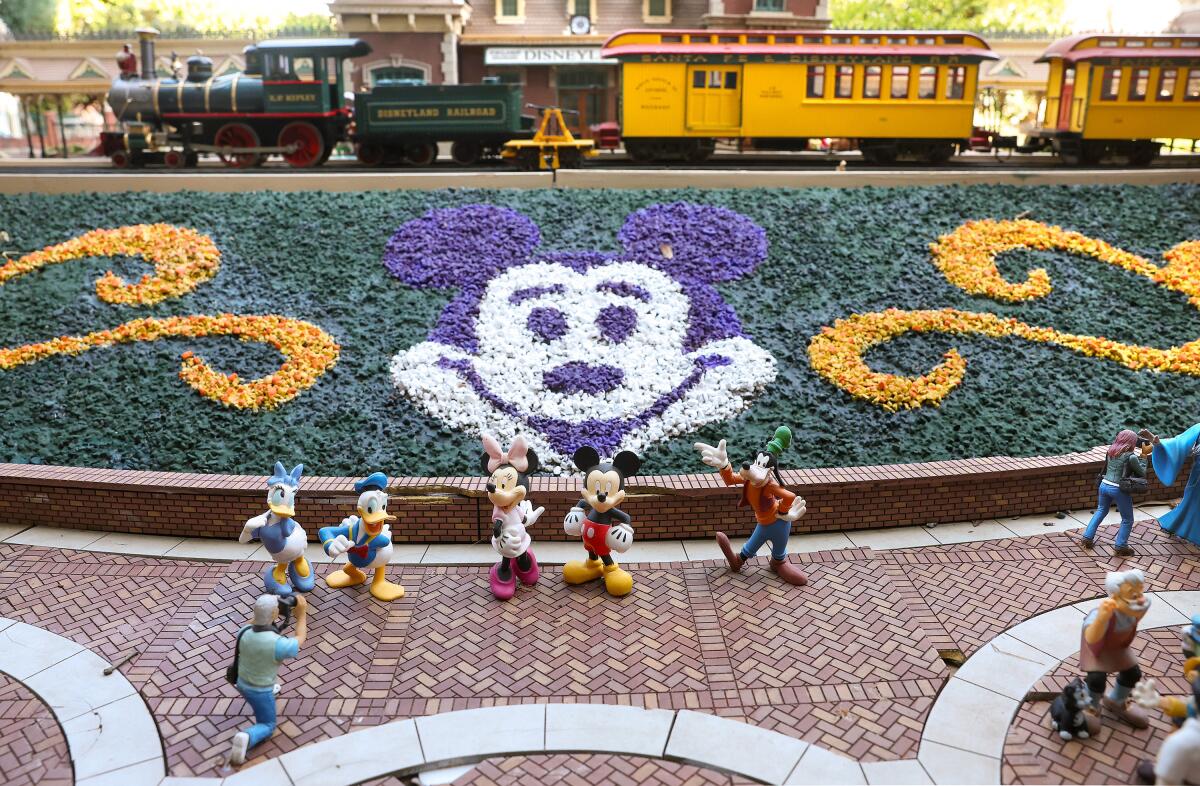 The iconic entrance to Disneyland is re-created in David and Frances Sheegog’s Anaheim backyard in miniature.