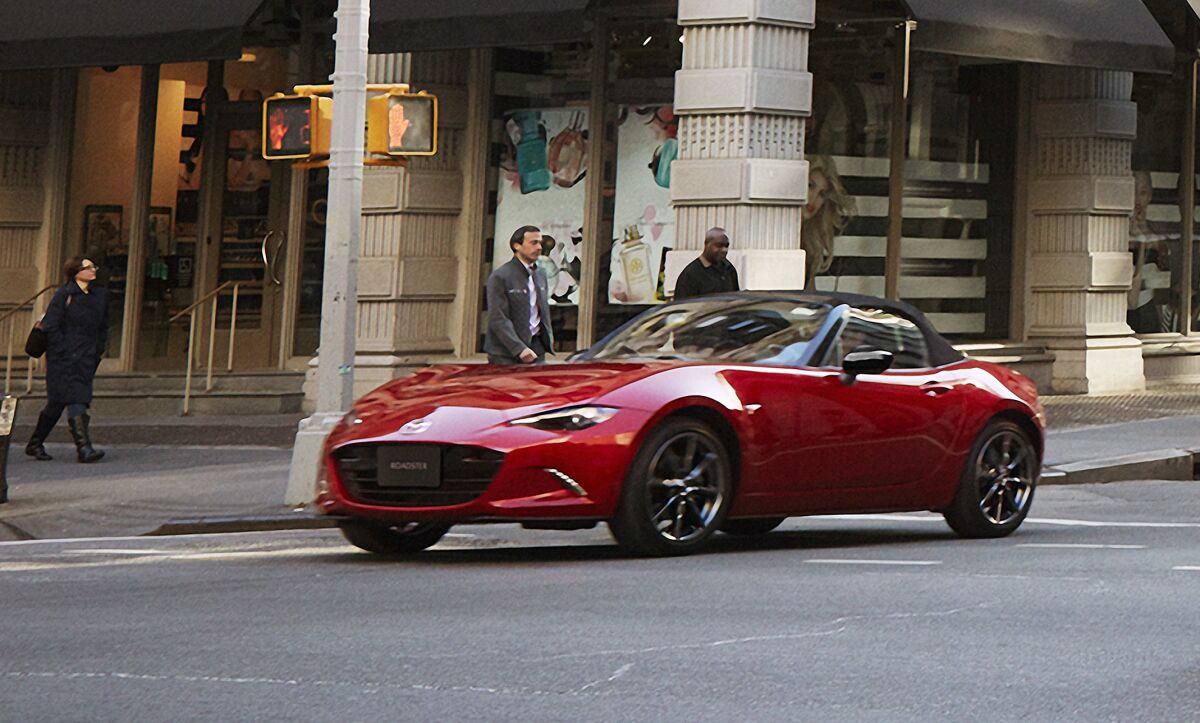 This photo provided by Mazda shows the 2022 Mazda MX-5 Miata, a small rear-wheel-drive roadster that's a rarity among cars today. (Mazda North American Operations via AP)