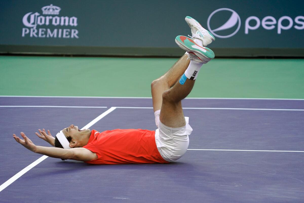 Taylor Fritz reacts after defeating Rafael Nadal, of Spain, during the men's singles finals.