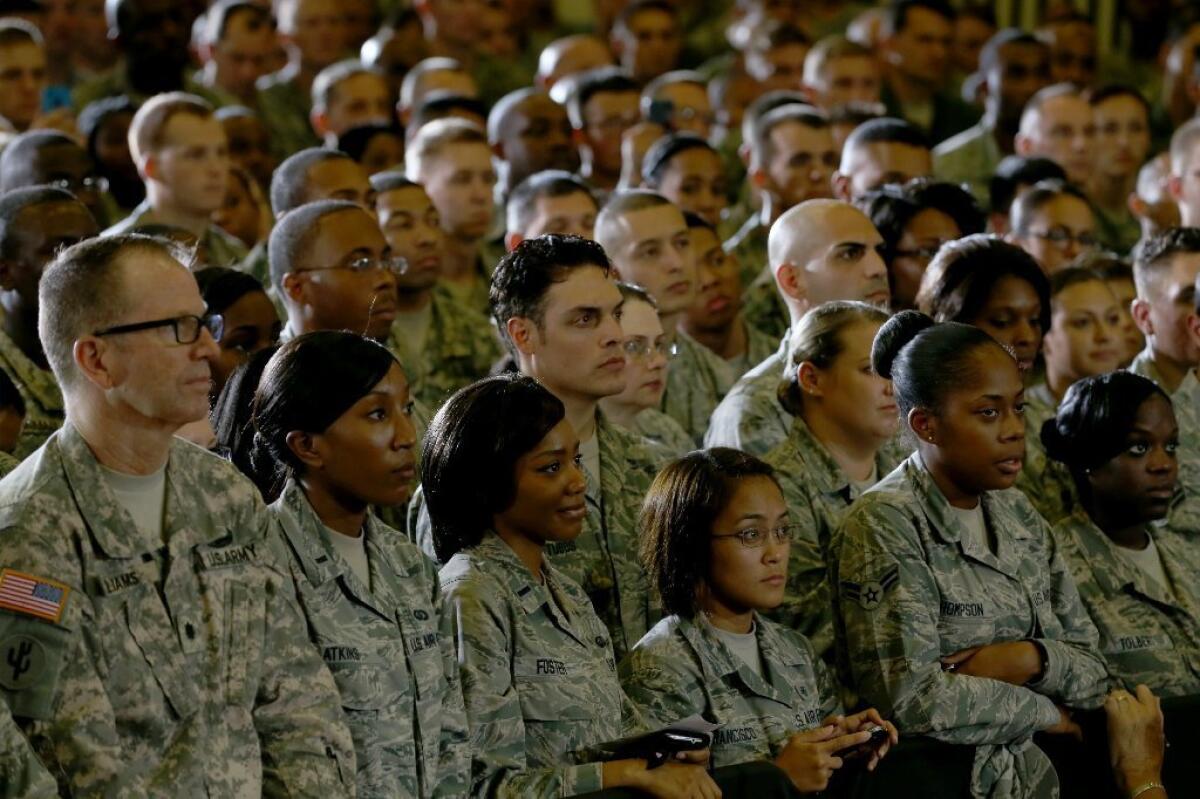 Soldiers listen as President Obama speaks during a visit to the U.S. Central Command in Tampa on Sept. 17.