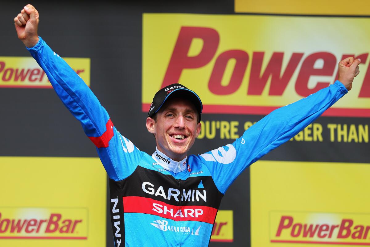 Dan Martin of Ireland celebrates on the podium after winning the ninth stage of the Tour de France on Sunday.