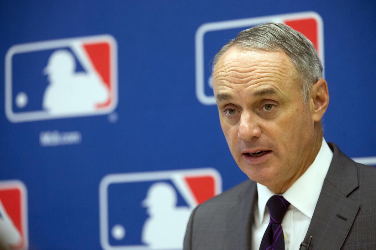 Rob Manfred speaks to reporters during a news conference at Major League Baseball headquarters in New York on May 19.