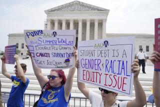 People demonstrate outside the Supreme Court, Friday, June 30, 2023, in Washington. A sharply divided Supreme Court has ruled that the Biden administration overstepped its authority in trying to cancel or reduce student loan debts for millions of Americans. Conservative justices were in the majority in Friday's 6-3 decision that effectively killed the $400 billion plan that President Joe Biden announced last year. (AP Photo/Jacquelyn Martin)