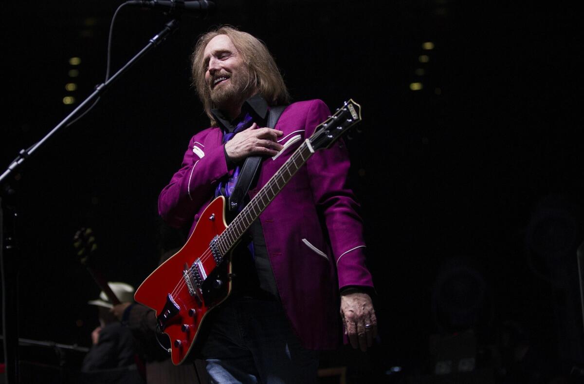 In this file photo from 2014, Tom Petty performs with the Heartbreakers at SDSU's Viejas Arena. The band's 1979 album "Damn the Torpedoes" is featured in the "Classic Albums" documentary series, one of the ways music fans can capture the feeling of Record Store Day. The celebration of independent record stores was rescheduled from April 18 to June 20, due to the coronavirus.