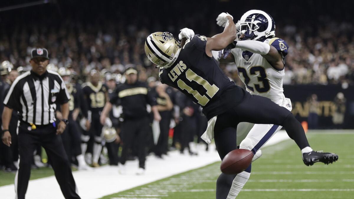 New Orleans wide receiver Tommylee Lewis works for a catch against Rams defensive back Nickell Robey-Coleman during the NFC Championship Game.