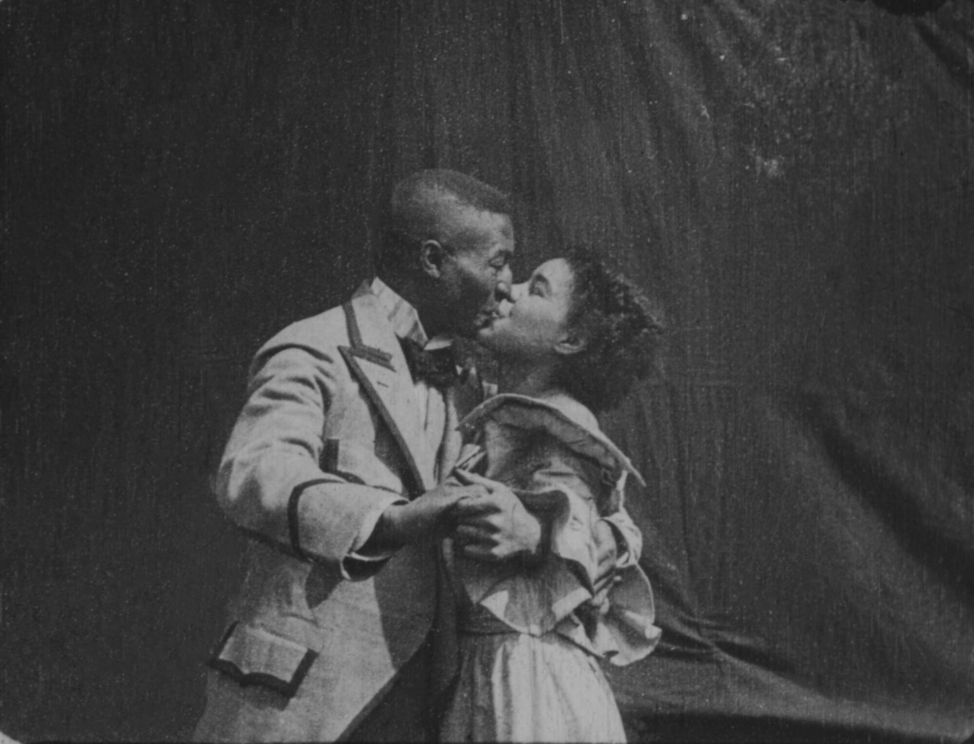 Film still from William Selig's Something Good - Negro Kiss (1898), with Saint Suttle and Gertie Brown.