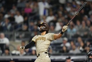 San Diego Padres' Fernando Tatis Jr. follows through on a two-run home run during the sixth inning of a baseball game against the New York Yankees, Friday, May 26, 2023, in New York. (AP Photo/Frank Franklin II)